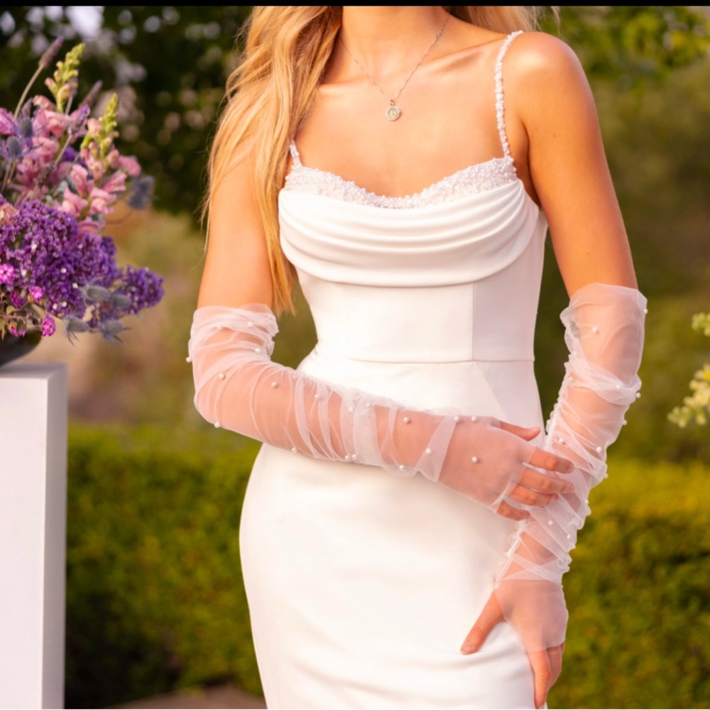 Elegant White Dress with Sheer Gloves